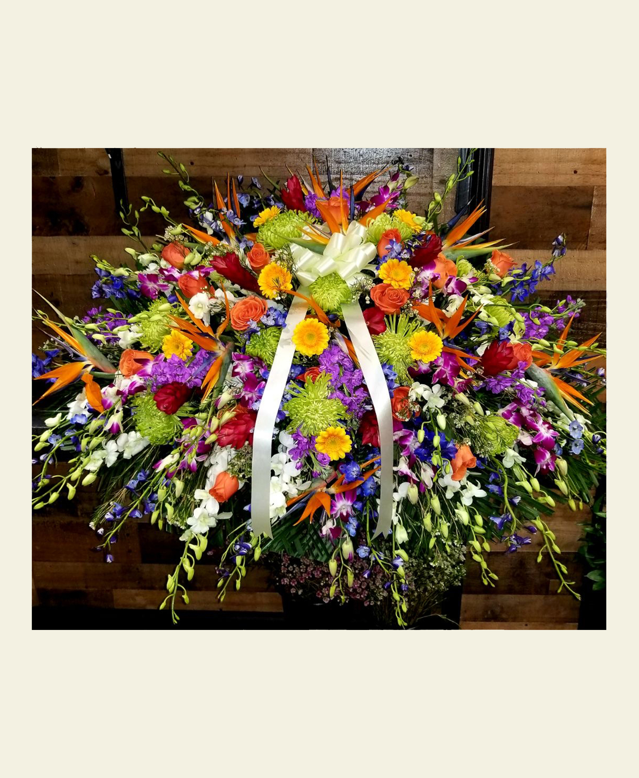 CS1480: Exotic Colorful Casket Spray - Floral Fantasy US